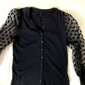 Black ribbed cardigan with retro polka dot mesh sleeves